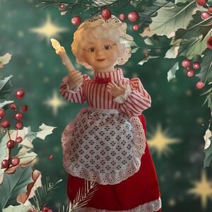 Festive Mrs. Claus Holiday Decor with Candle